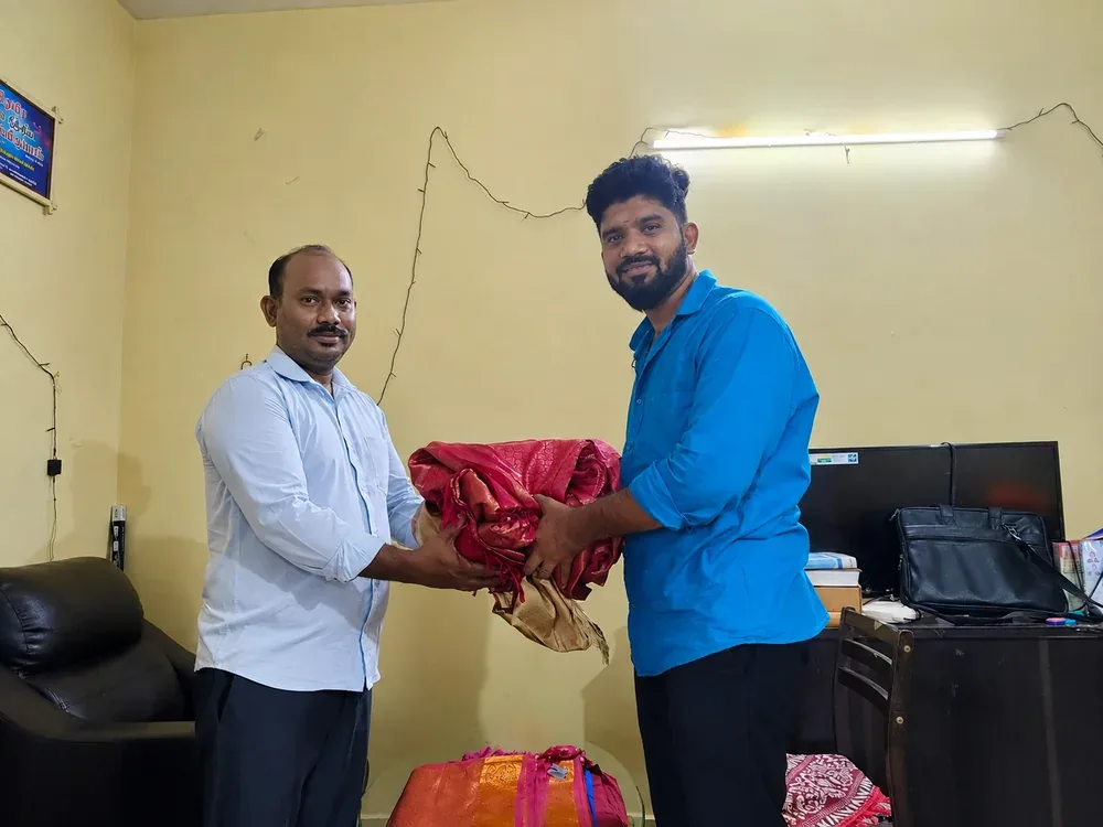 Old silk saree buyers in Chennai — folded silk saree received from a customer at their office