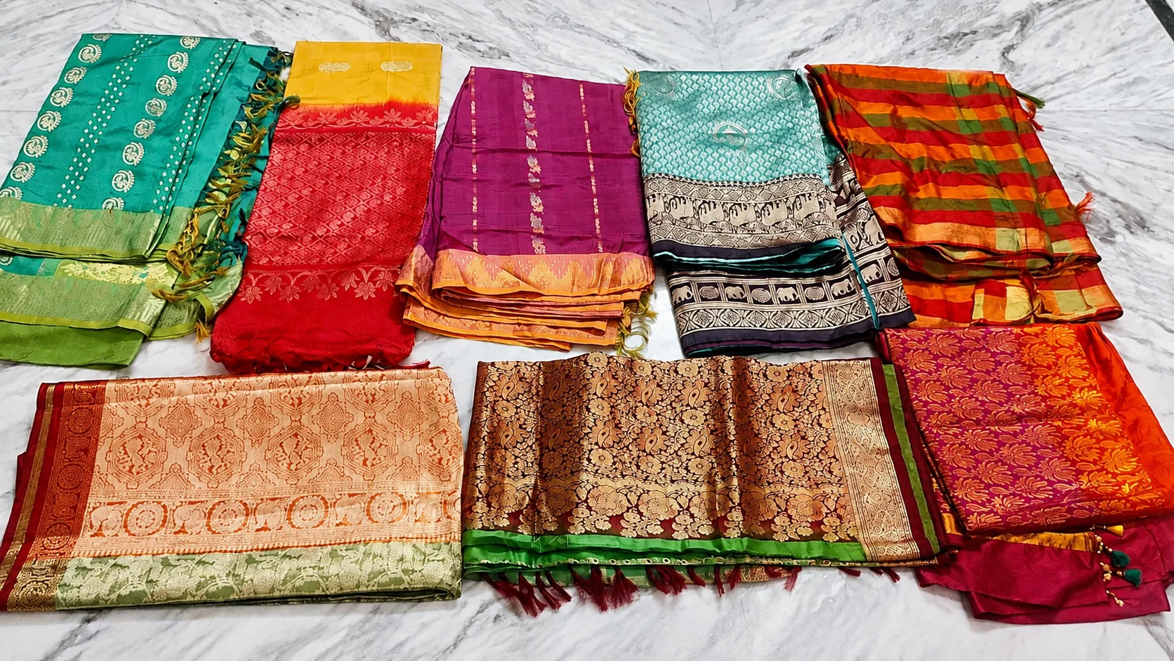 Old silk saree buyers in Chennai — collection of colourful old silk and pattu sarees ready for purchase